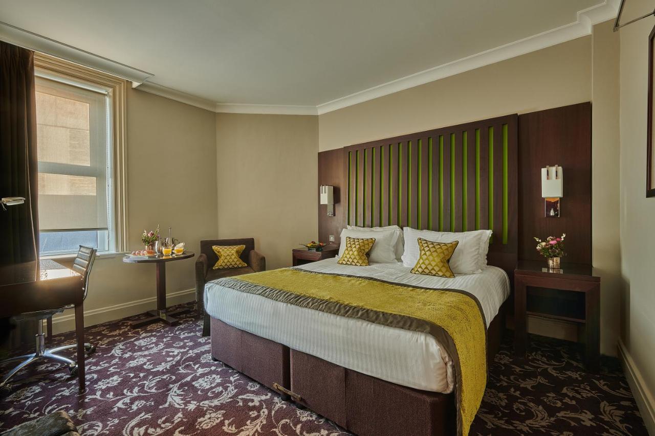 Grand Jersey Hotel And Spa Saint Helier Jersey Kültér fotó A bedroom at the hotel