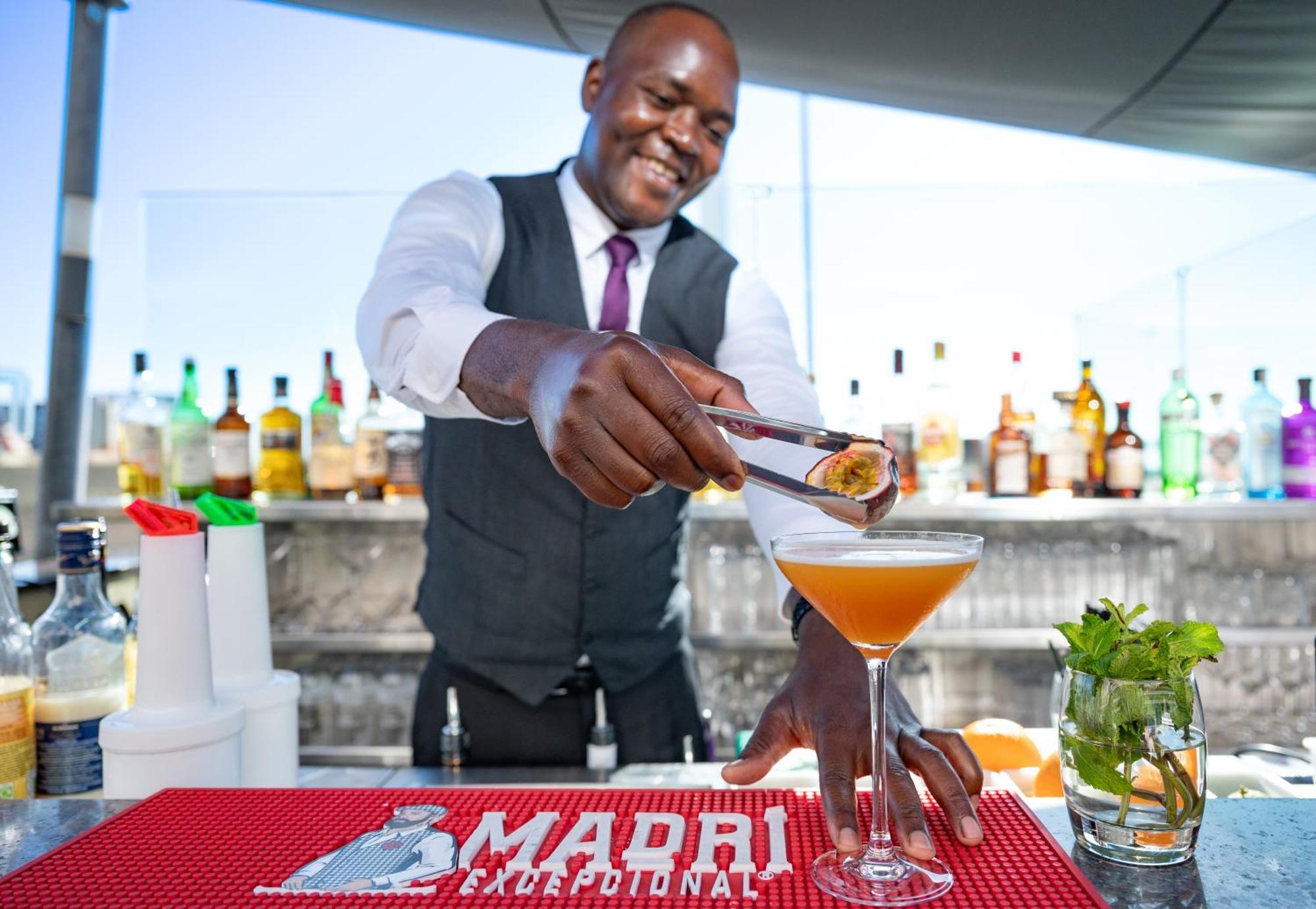 Grand Jersey Hotel And Spa Saint Helier Jersey Kültér fotó A bartender at work